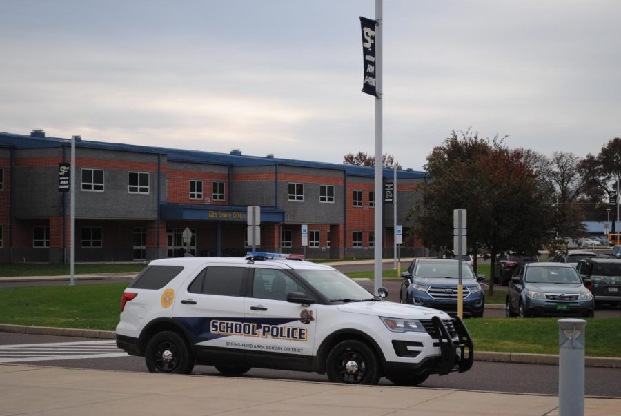 A Spring-Ford school police vehicle is parked outside the 10-12 Center. 
