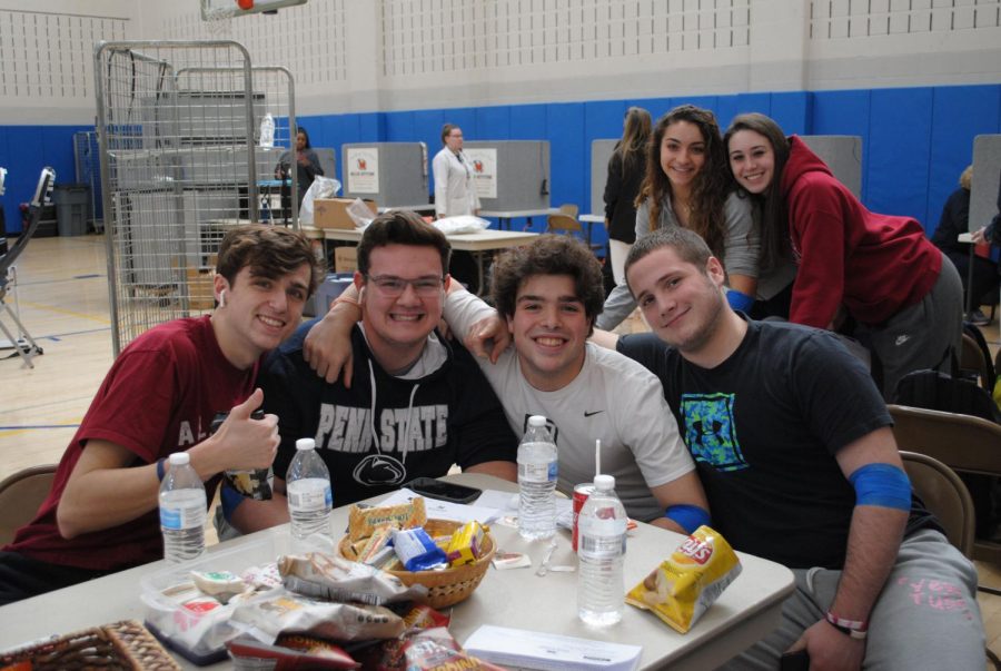 Spring-Ford students (from left) Joe Morgan, Cody Lutz, Gunnar Romano, Peyton Gensler, Mandie Pierce, and Lexy Hammer take part in the schools blood drive. 
