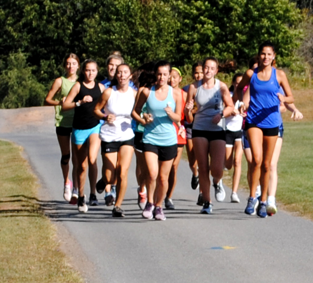 The girls cross country team trains Sept. 23 on campus. 