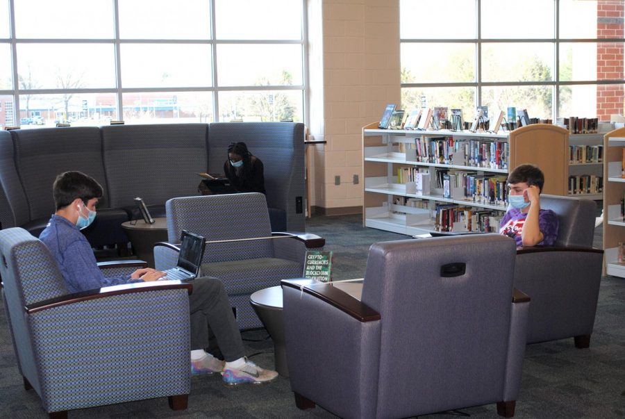 Spring-Ford students (from left) Joe Brogan, Destiny Barnes, and Anthony Sharpe study in the media center while socially distanced. 