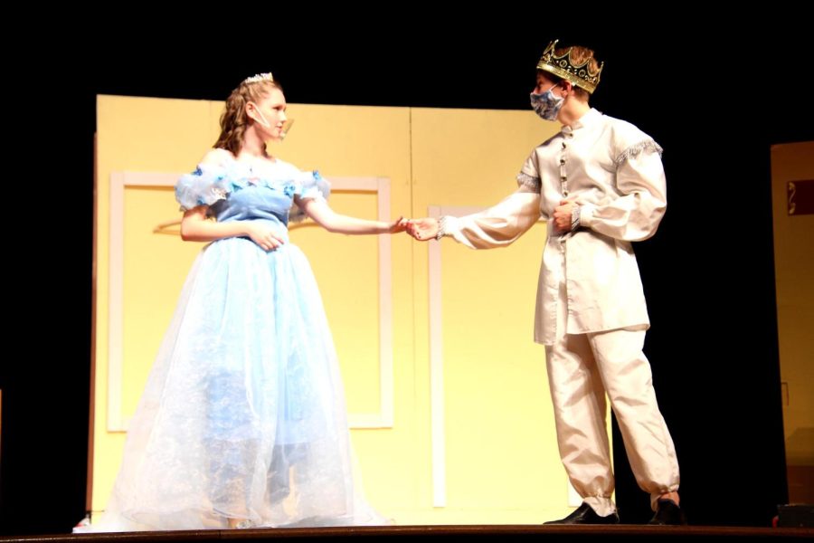 Katie Moretz, as Cinderella, and Brendan MacCoy, as Prince Charming, meet in the Spring-Ford Theater production of 
“Cinderella.” 