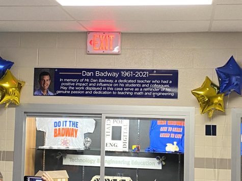 A memorial for teacher Dan Badway stands at the Technology and Engineering 
Education display in the 10-12 Center. 