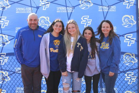Spring-Ford senior Maggie Ackerman celebrates her college decision with family members during Decision Day. 