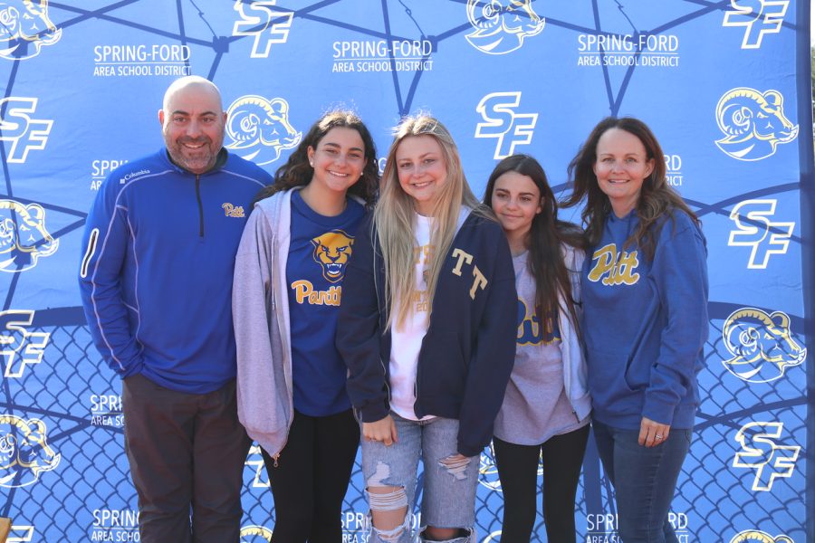 Spring-Ford senior Maggie Ackerman celebrates her college decision with family members during Decision Day. 