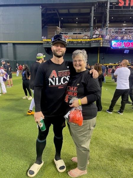 Spring-Ford’s Julie Signorovitch poses with her son, Christian Walker, after the Diamondbacks defeated the Phillies in the MLB playoffs last fall.  SUBMITTED PHOTO