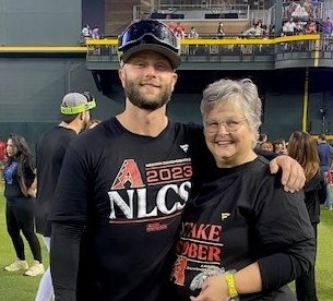 Spring-Ford’s Julie Signorovitch poses with her son, Christian Walker, after the Diamondbacks defeated the Phillies in the MLB playoffs last fall.  SUBMITTED PHOTO