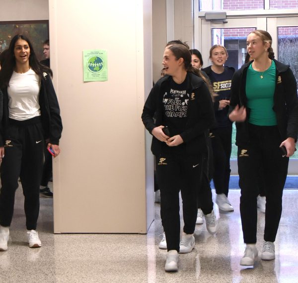The Spring-Ford girls basketball team is cheered on by classmates as they leave for the PIAA 6A State Championship Game on March 22. Staff Photo.