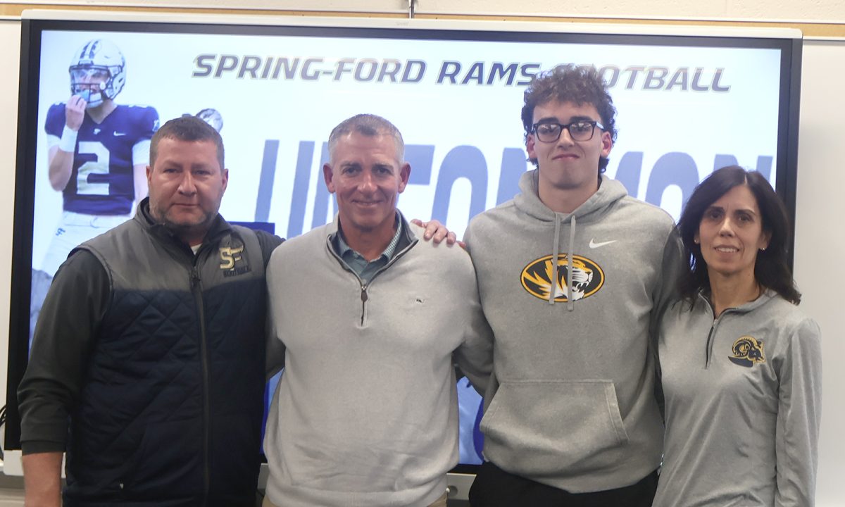 Spring-Ford+junior+Matt+Zollers+announced+his+decision+to+attend+the+University+of+Missouri+on+Thursday%2C+April+4.+Zollers+is+joined+by+Spring-Ford+football+coach+Chad+Brubaker+%28left%29+as+well+as+his+parents+Pete+and+Beth+Zollers.+